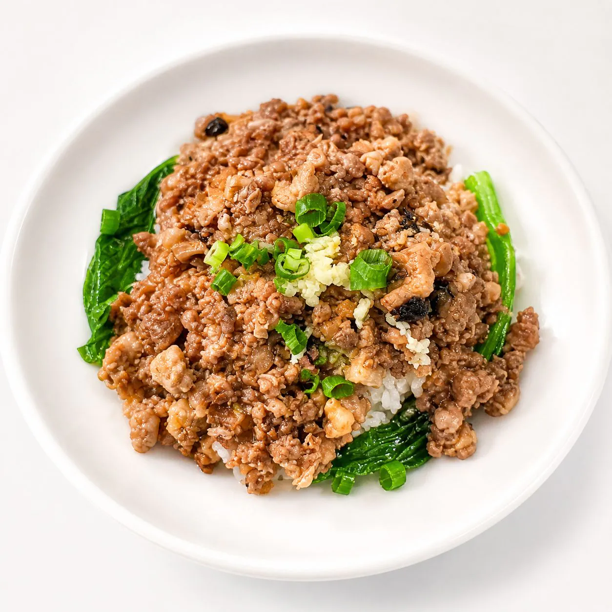 Braised minced pork rice with minced pork and leafy greens