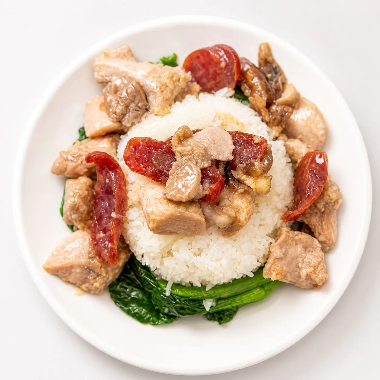 Chinese cured sausage and chicken rice with vegetables